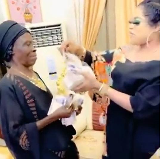Bobrisky spoils grandma who declared love for him with stash of money (Video)