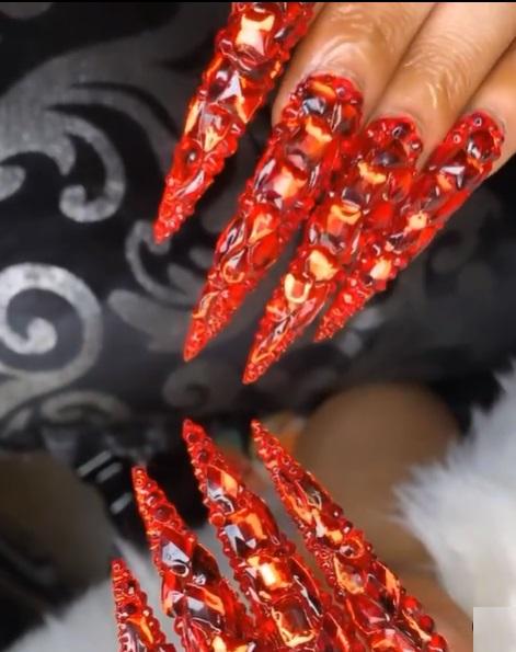 Bobrisky flaunts nails of 200K, threatens not to see it on anyone else (Video)