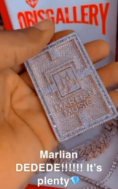 Singer, Naira Marley gifts himself customized diamond neck chain (Video)