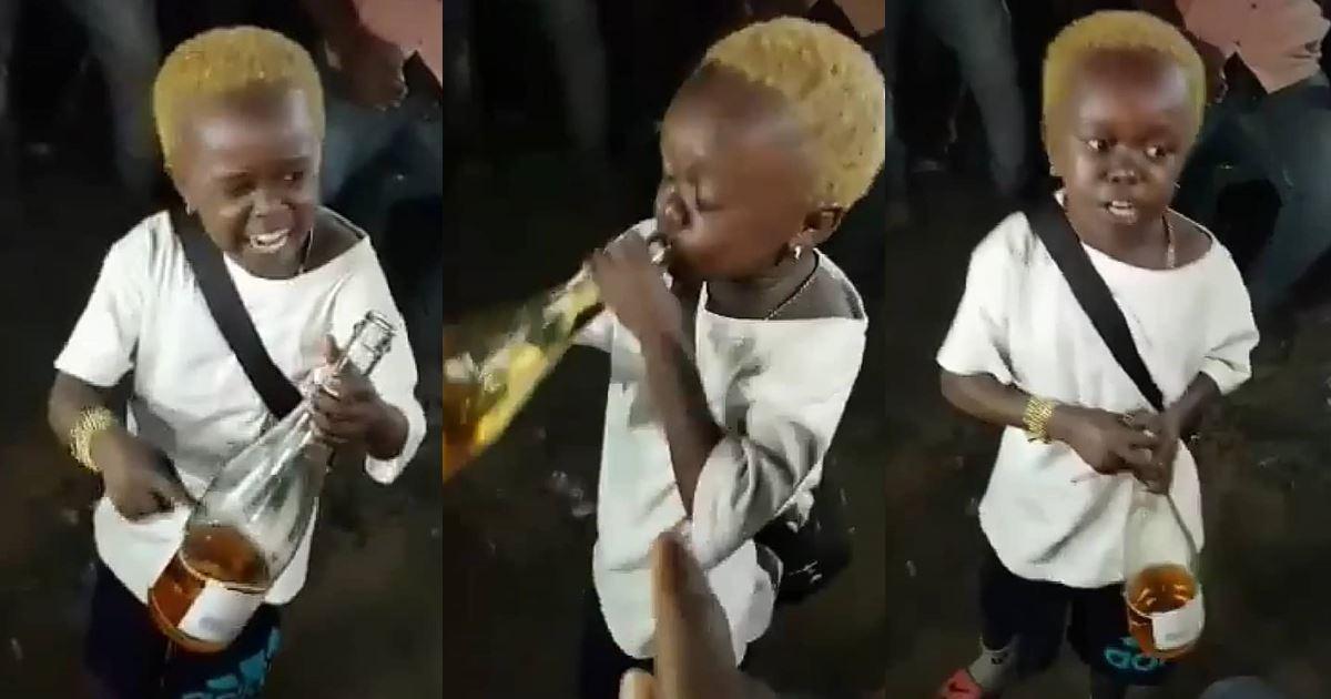 "Allow me to enjoy myself" - Little boy screams while consuming bottle of alcoholic drink amid cheers (Video)