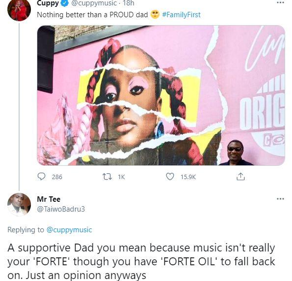 "Nothing better than a proud dad" - Reactions as Femi Otedola pose beside DJ Cuppy's billboard