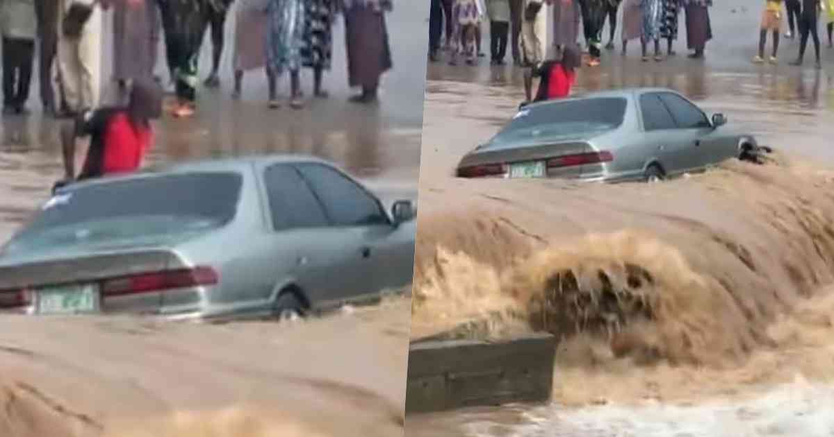 Man gets stranded alongside his car amid heavy flood in Lagos (Video)