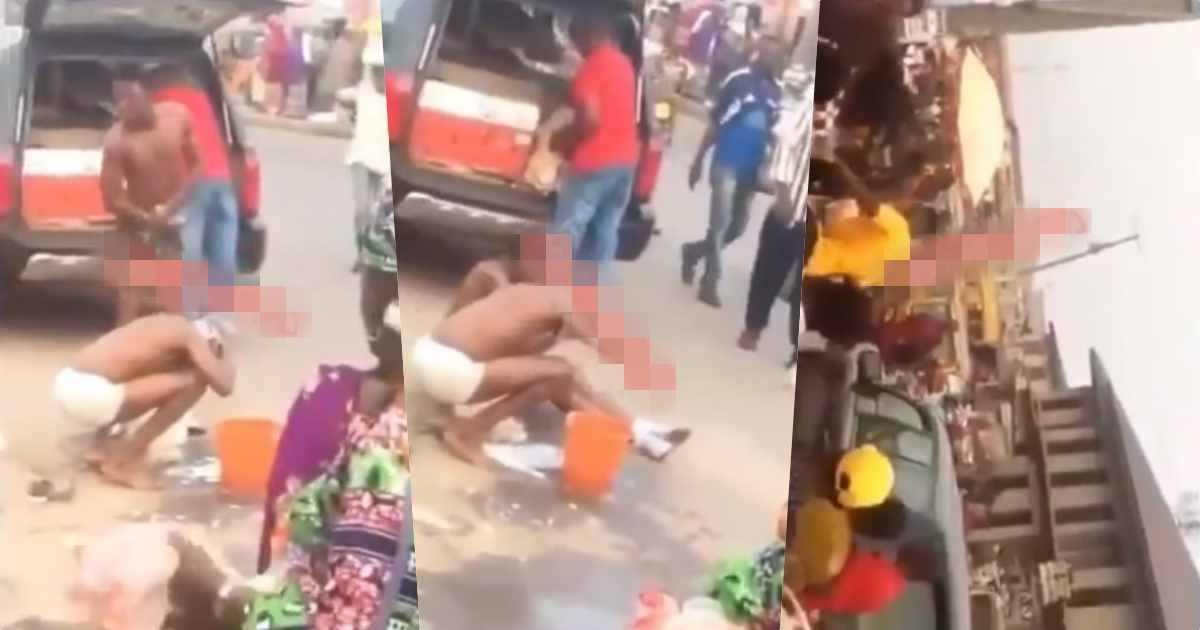 Suspected yahoo boys beaten to pulp for bathing in the middle of market (Video)