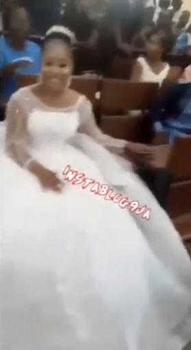 University of Abuja student makes grand entrance into exam hall on wedding dress (Video)