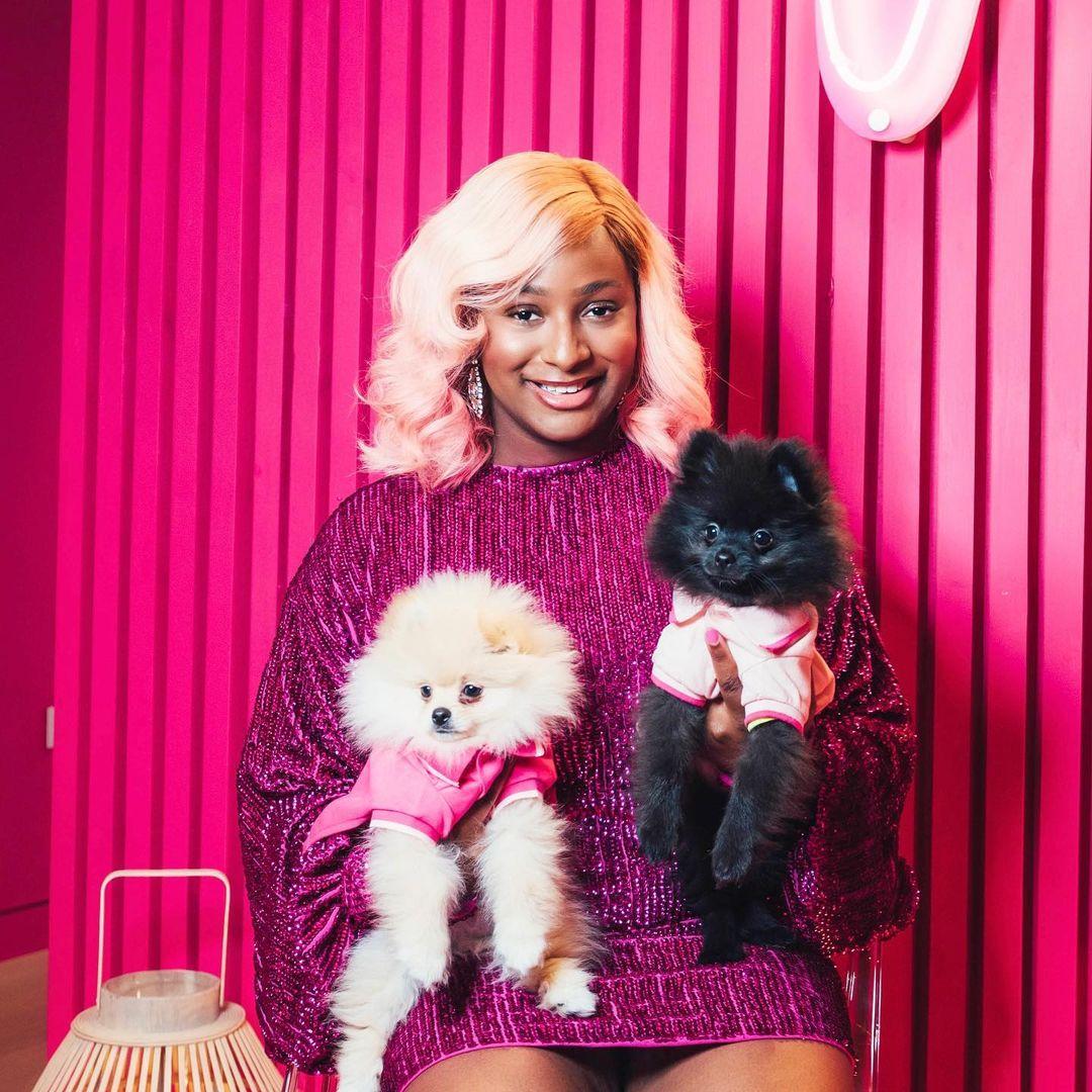 DJ Cuppy takes her dogs Dudu and Fun Fun on a special visit to Grandpa Femi Otedola (Video)