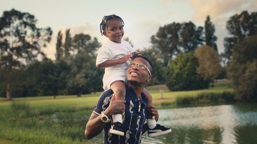 Wizkid’s son, Zion, shows off his dance skills alongside his dad's manager (Video)