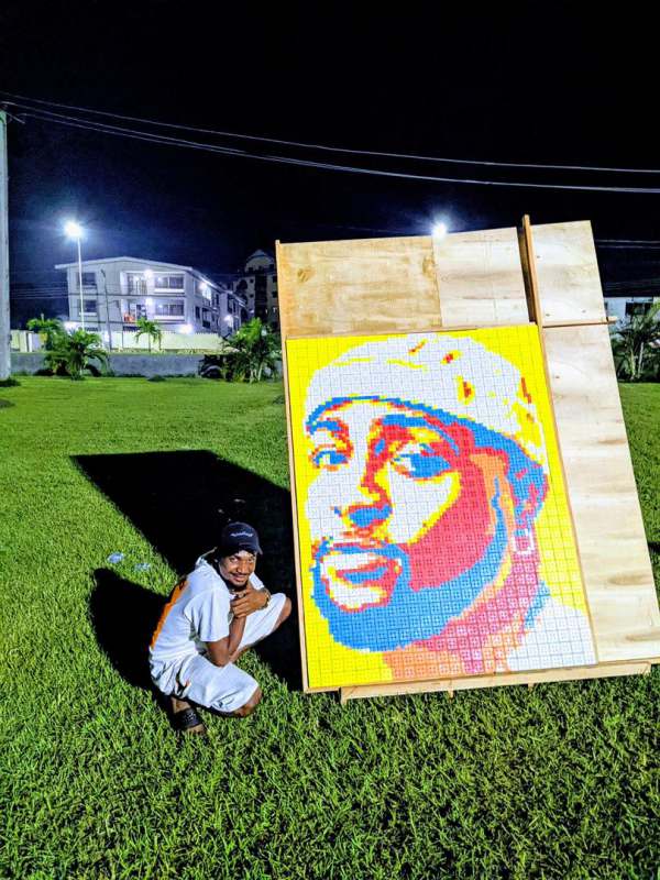 Man creates unique portrait of Davido using 800 Rubik’s cubes (Video)