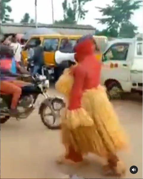 Moment masquerade was spotted preaching the gospel of Jesus Christ on the street (Video)