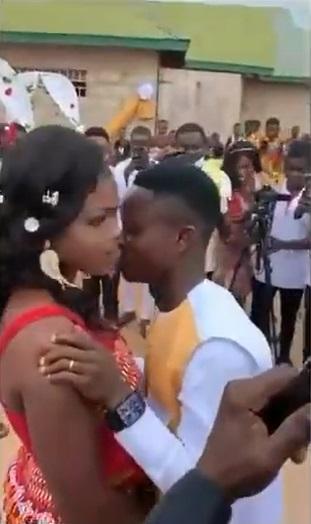 Drama as shy bride refuses to kiss her husband on their wedding day (Video)