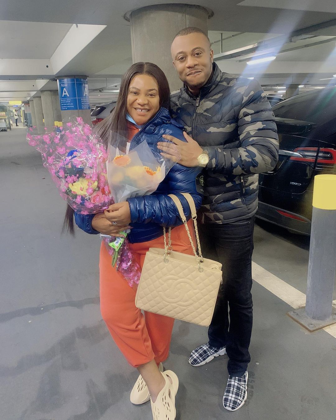 Moment Nkechi Blessing's husband welcomes her to London following mother's burial (Video)
