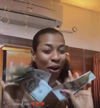 Reality star, Nini flaunts hard currency, other gifts from fans (Video)