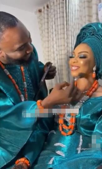 Groom melts hearts after reportedly doing bride's makeup on their wedding (Video)