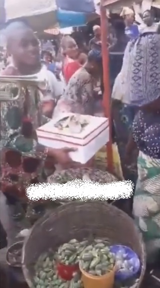 Man surprises mother who sells okra with birthday serenade at market (Video)