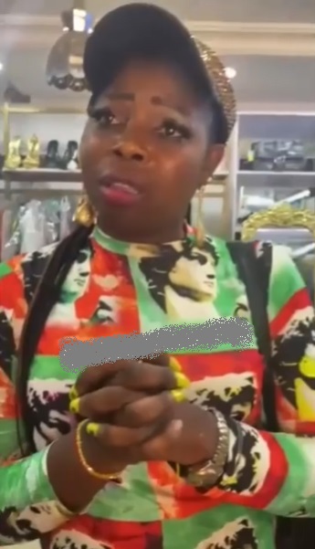 “Please don't disgrace me” - Woman pleads after being caught stealing clothing material (Video)