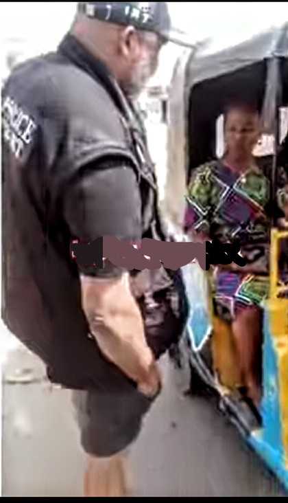 "Second time in a week"- Reactions as police officer gifts bags of rice to residents for Christmas