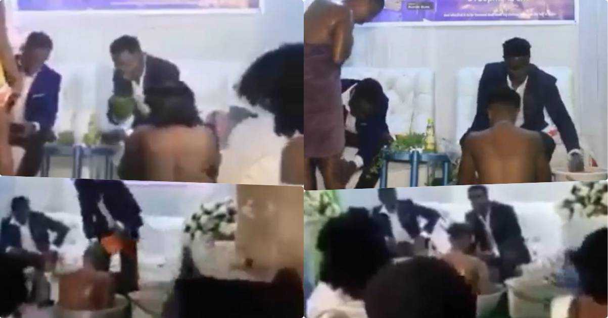 Pastor bathes female church members on altar during cross over night (Video)