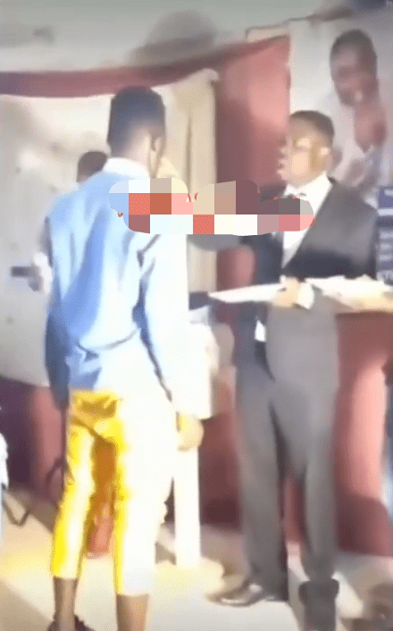Pastor makes members lick his fingers after swallowing balls of fufu during 'Holy Communion' (Video)