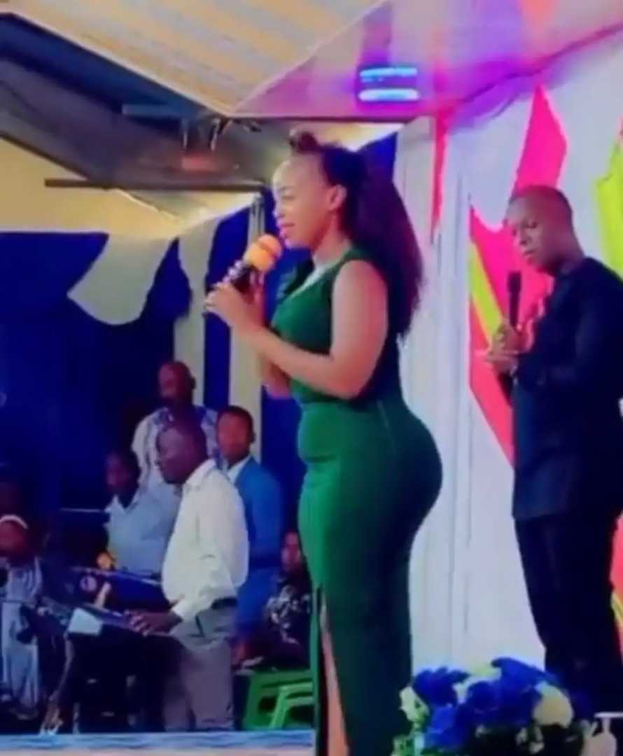 Moment pastor stares in wonder at curvy female congregation without letting go (Video)
