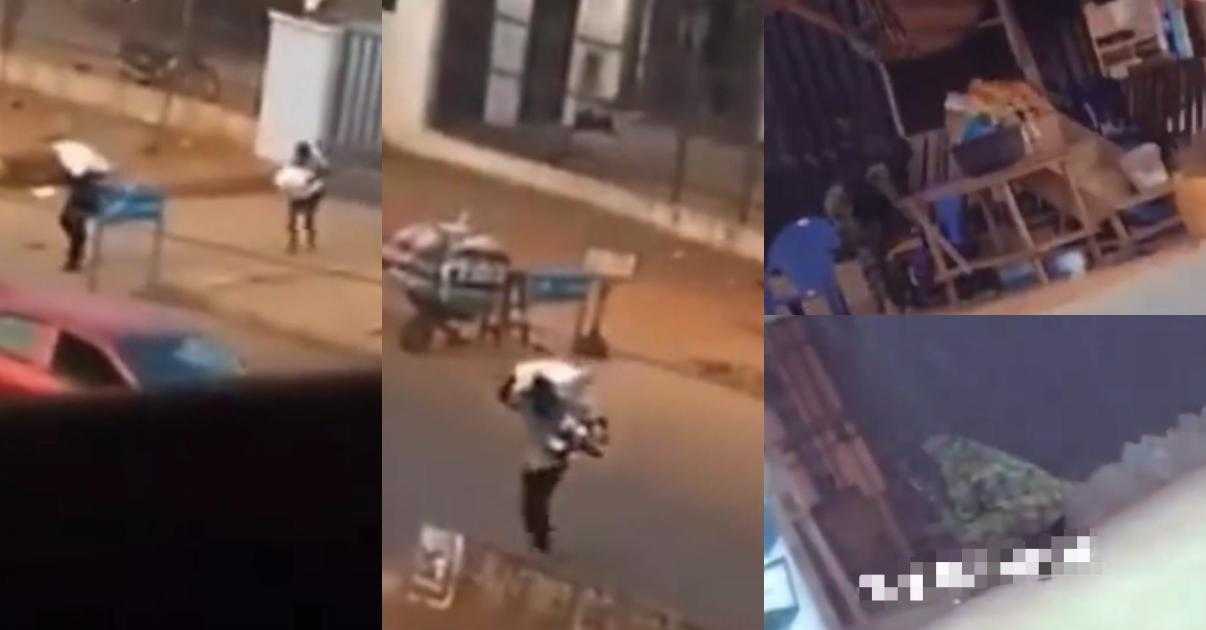 Military men spotted hiding as armed robbers cart away sacks of money in Edo (Video)