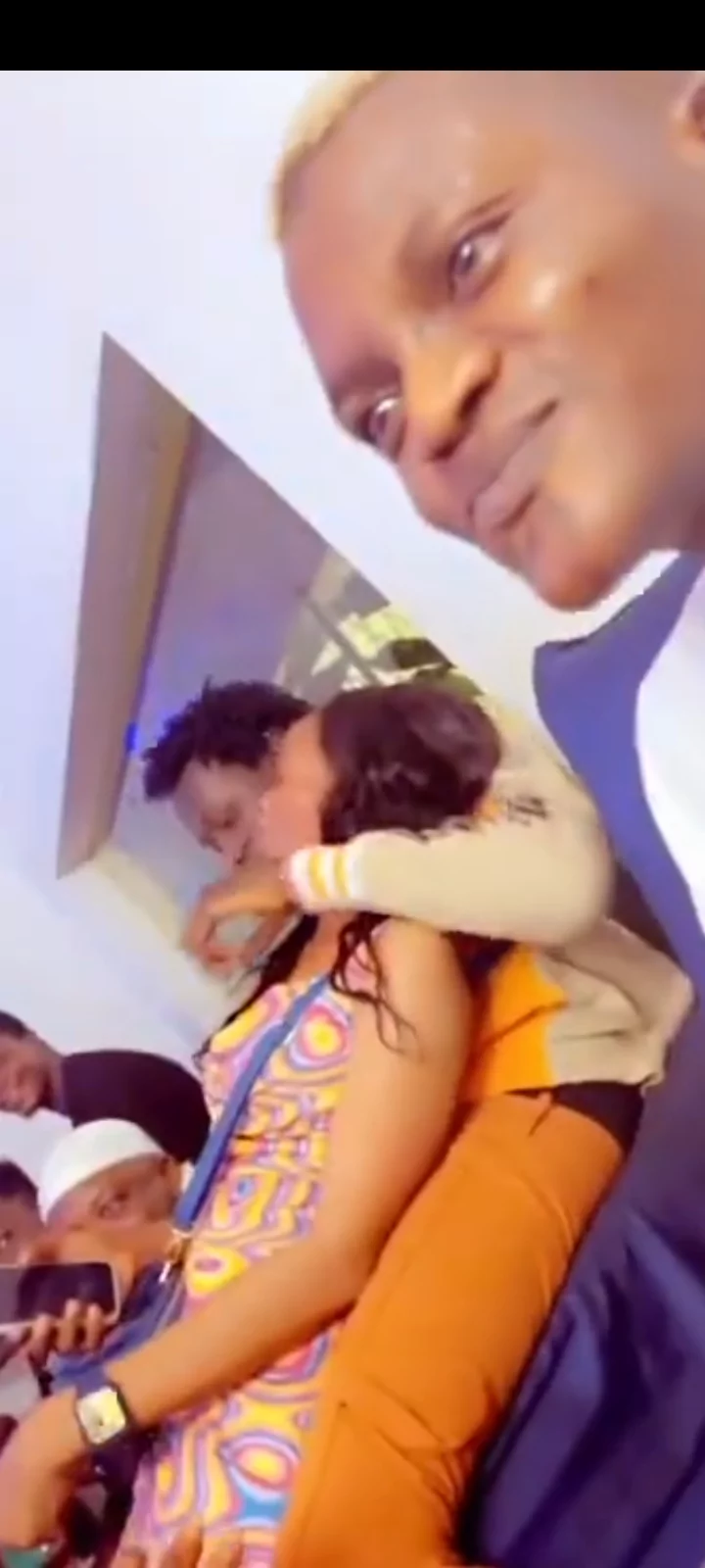 "Say yes" - Lady goes on her knees to propose to Portable (Video)