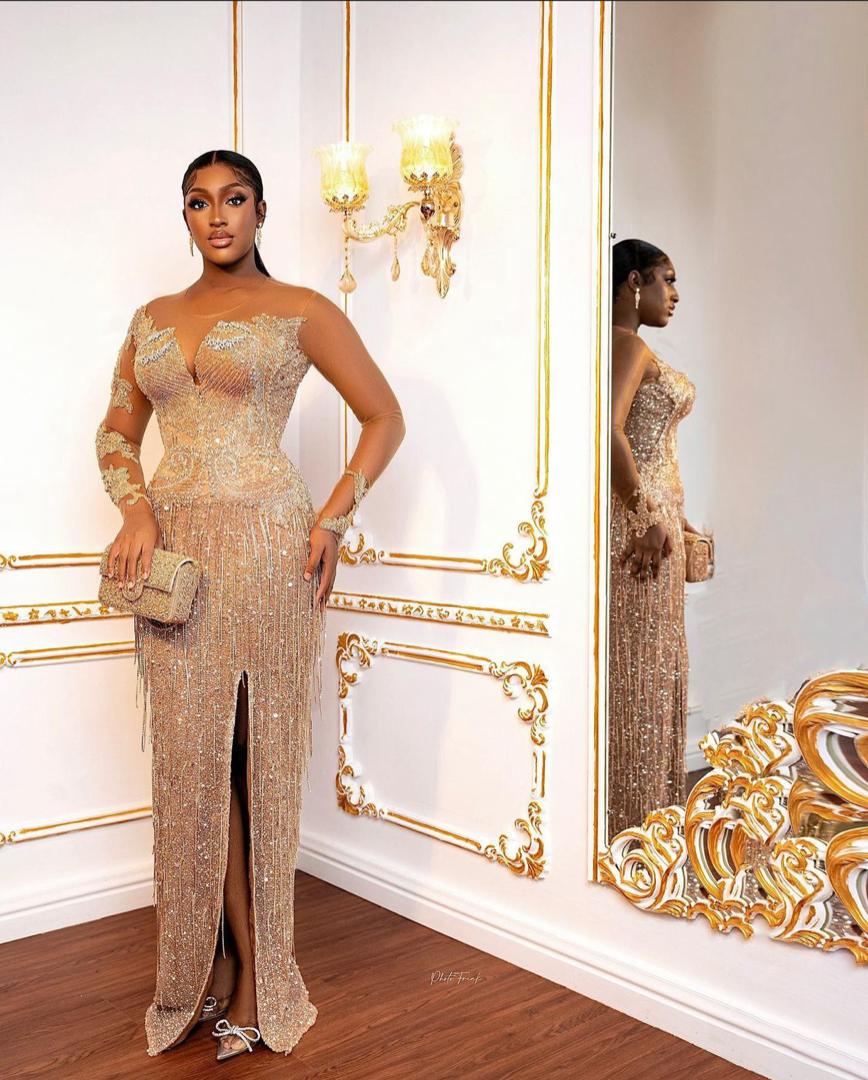 Bribe rocks 14 gorgeous dresses on her wedding day (Video)