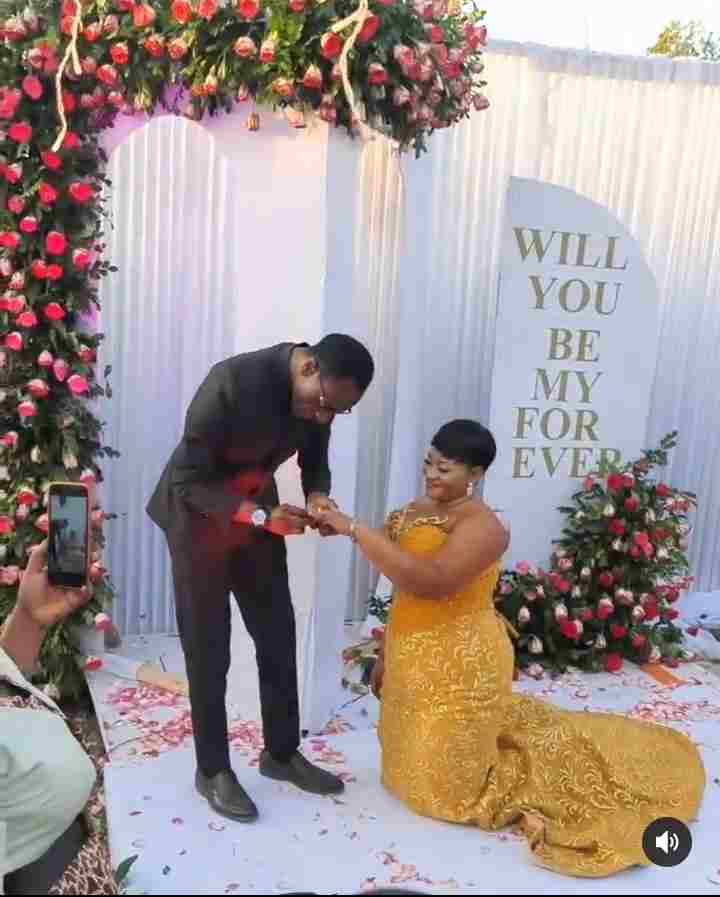 Reactions as lady goes on her knees as fiance proposes to her (Video)