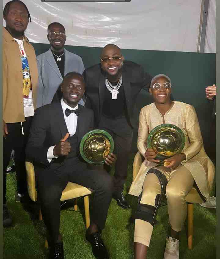 Moment Davido was invited on stage at CAF Awards 2022, strikes pose with winners (Video)