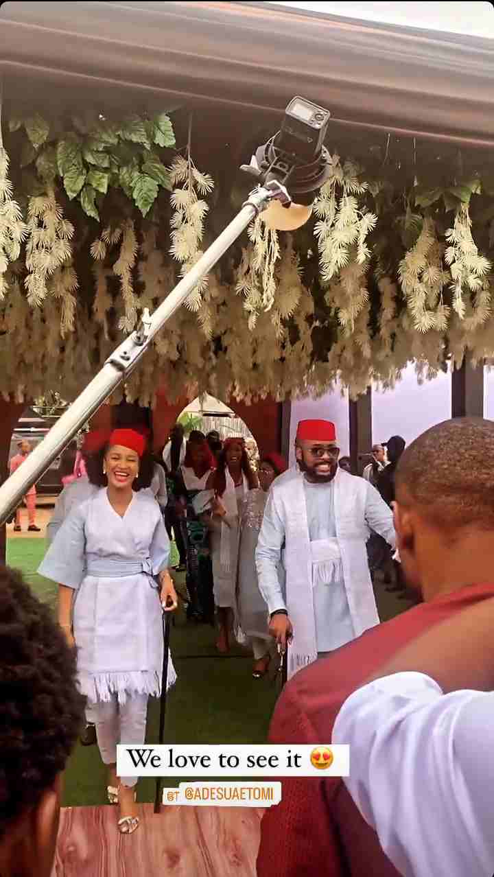 Moment Banky W and wife, Adesua stole the show at Mercy Chinwo's traditional marriage with their grand entrance (Video)