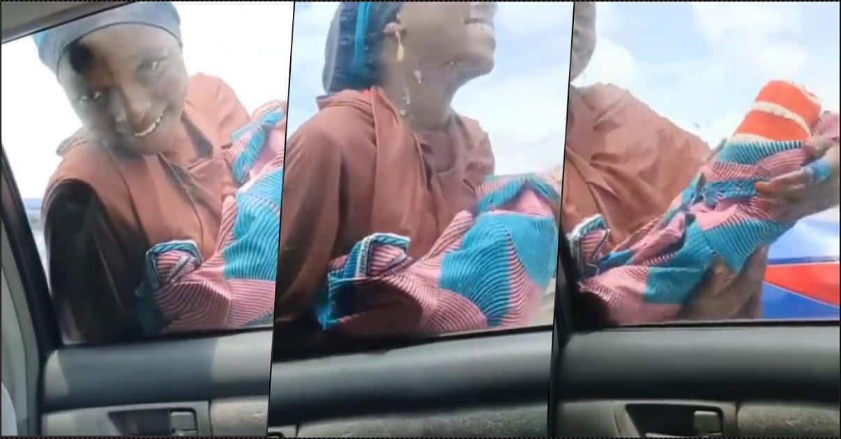 Lady spotted begging for alms with 'fake baby' (Video)