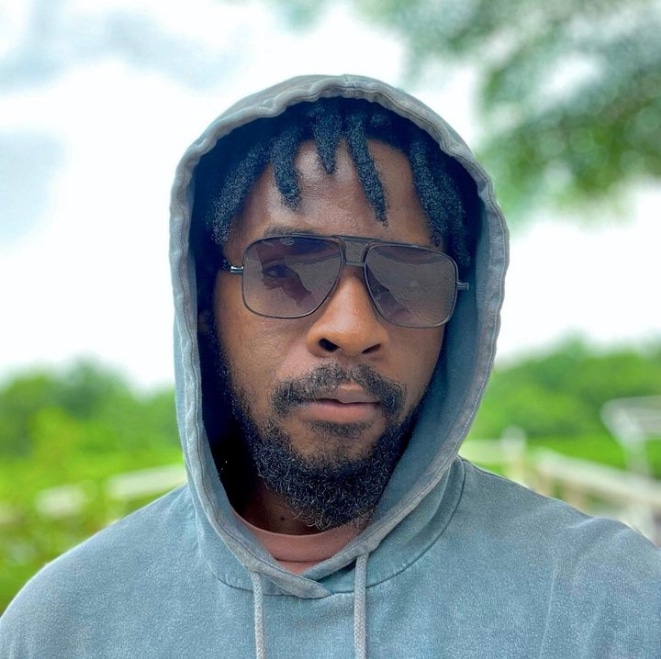 Johnny Drille melts hearts, shares mobile number publicly to fans