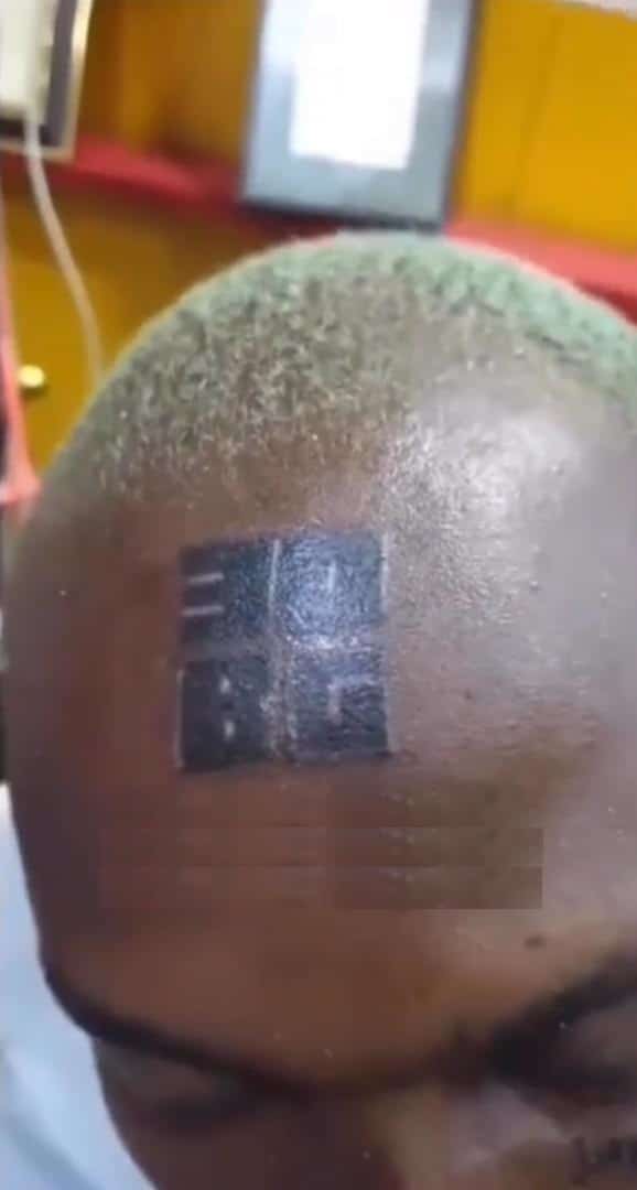 Man ridiculed for tattooing '30BG' on forehead (Video)