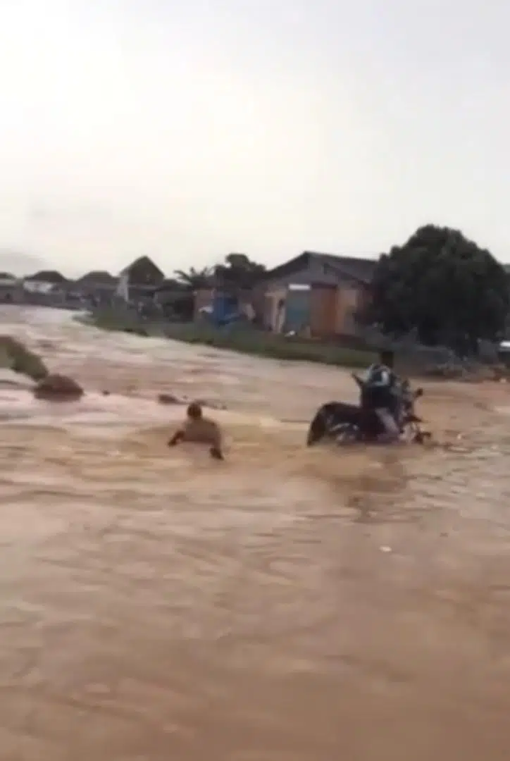 Lagos Flood and Bike Rider