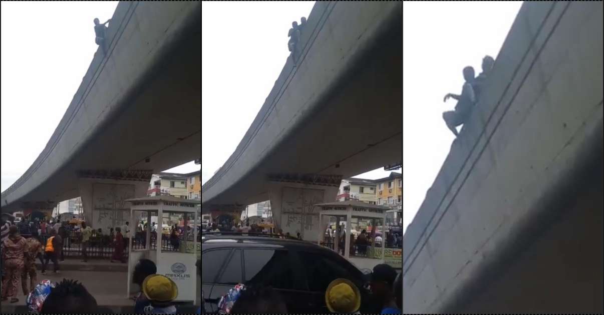Onlookers save man with smart move while attempting to jump off bridge in Lagos (Video)