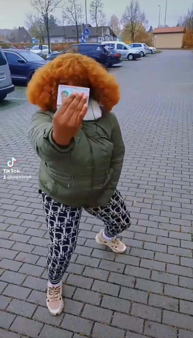 Nigerian woman dances joyfully as she and son get permanent residence permit after seven years in Germany (Video)