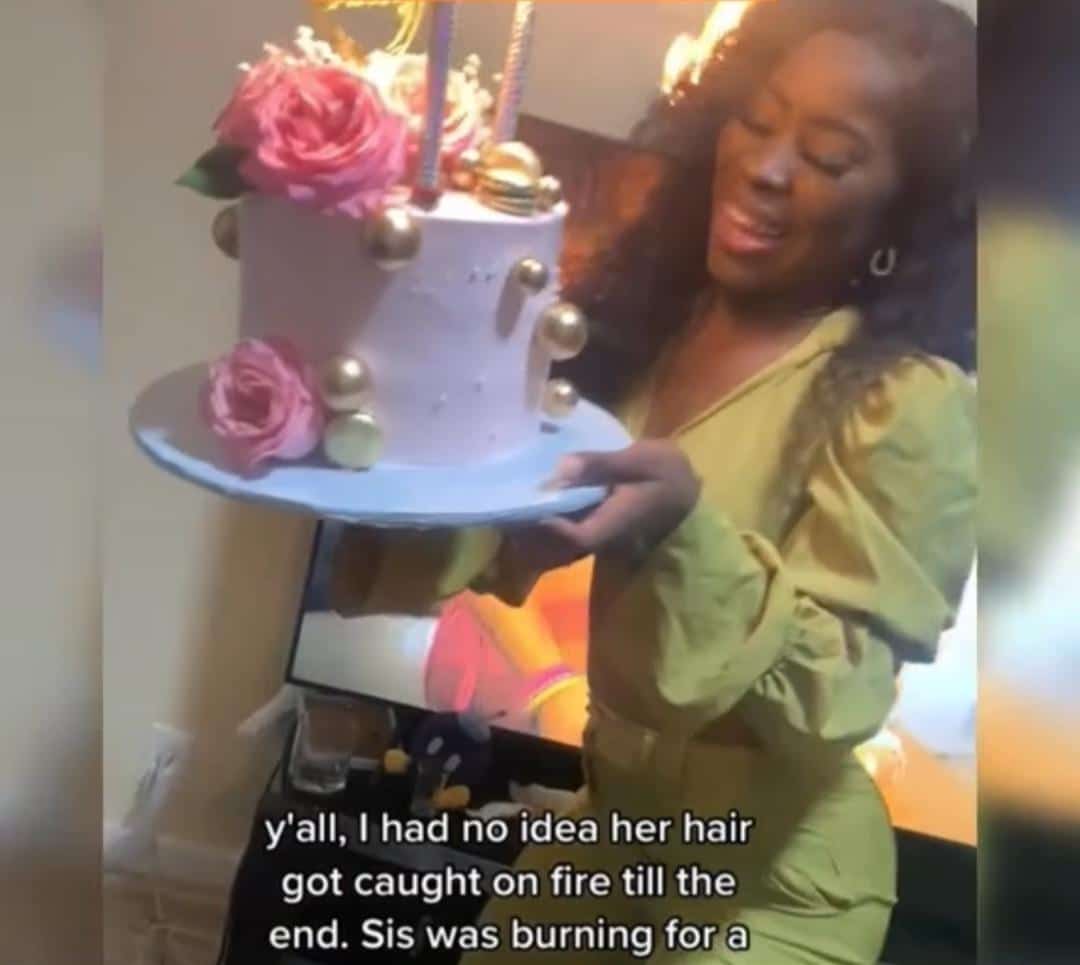 Moment celebrant’s wig catches fire while checking out birthday cake (Video)