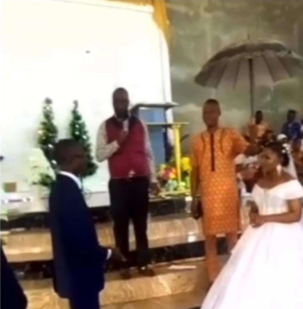 Drama as groom makes a scene when asked to kiss the bride (Video)