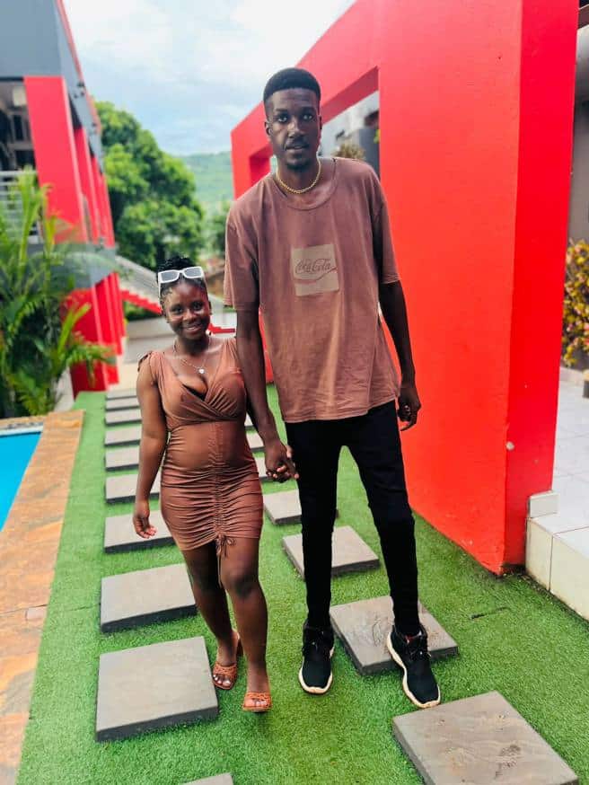 "This lady is strong" — Reactions trails adorable photos of tallest man in South Africa and his babe