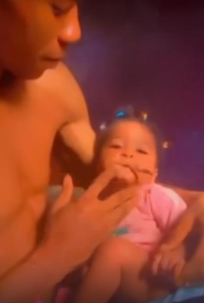 Shock as mother records as man feeds their baby with weed (Video)
