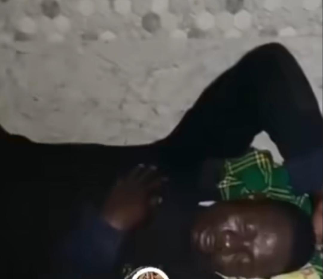 Security man cries for help after being caught by boss while sleeping on duty (Video)