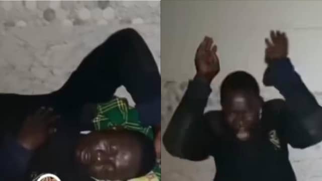 Security man cries for help after being caught by boss while sleeping on duty (Video)