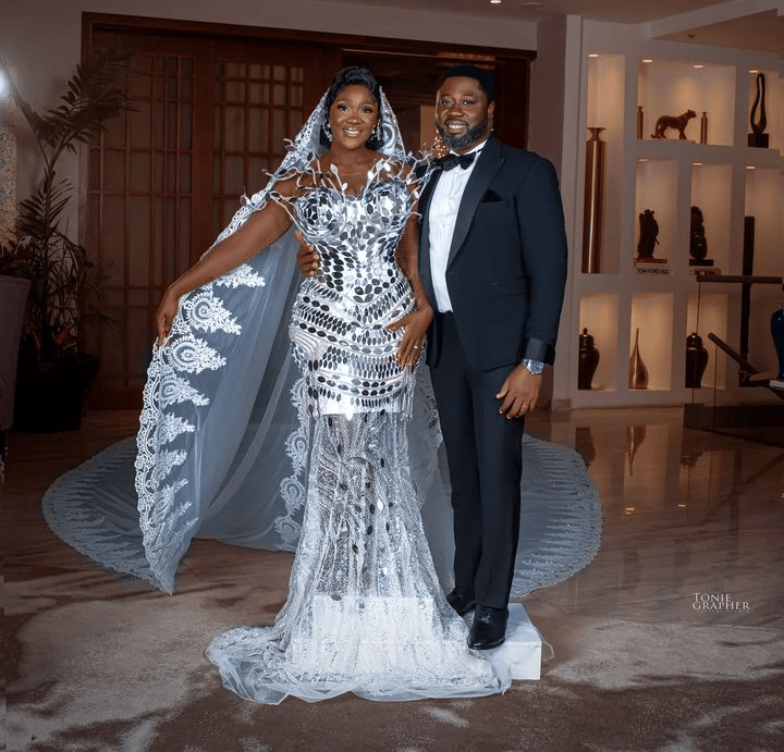 “She be God?” - Reactions as bride kneels for Mercy Johnson during