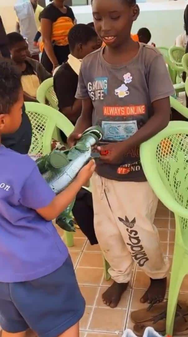 Wizkid's son melts heart as he gives out his toys in Ghana (Video)