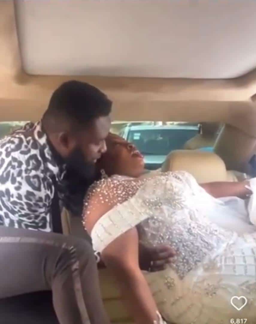 Drama as tight-fitted wedding gown hinders bride from entering car (Video)