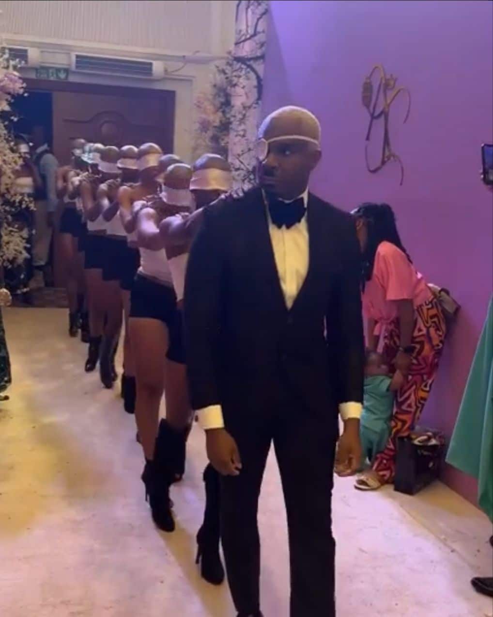 Pretty Mike tells tale as he storms event with entourage of bald blindfolded ladies (Video)