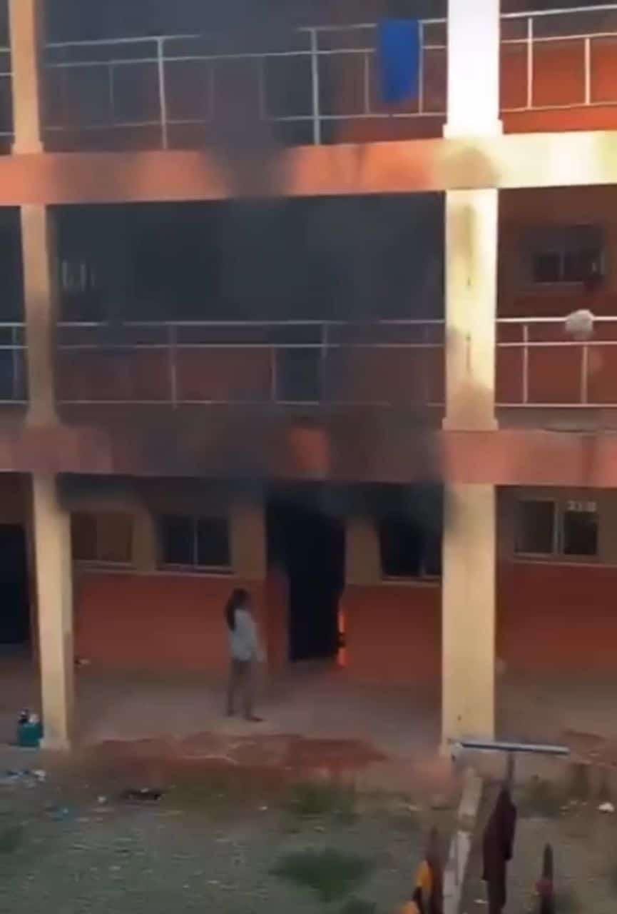 UniAbuja student wielding knife sets hostel on fire (Video)