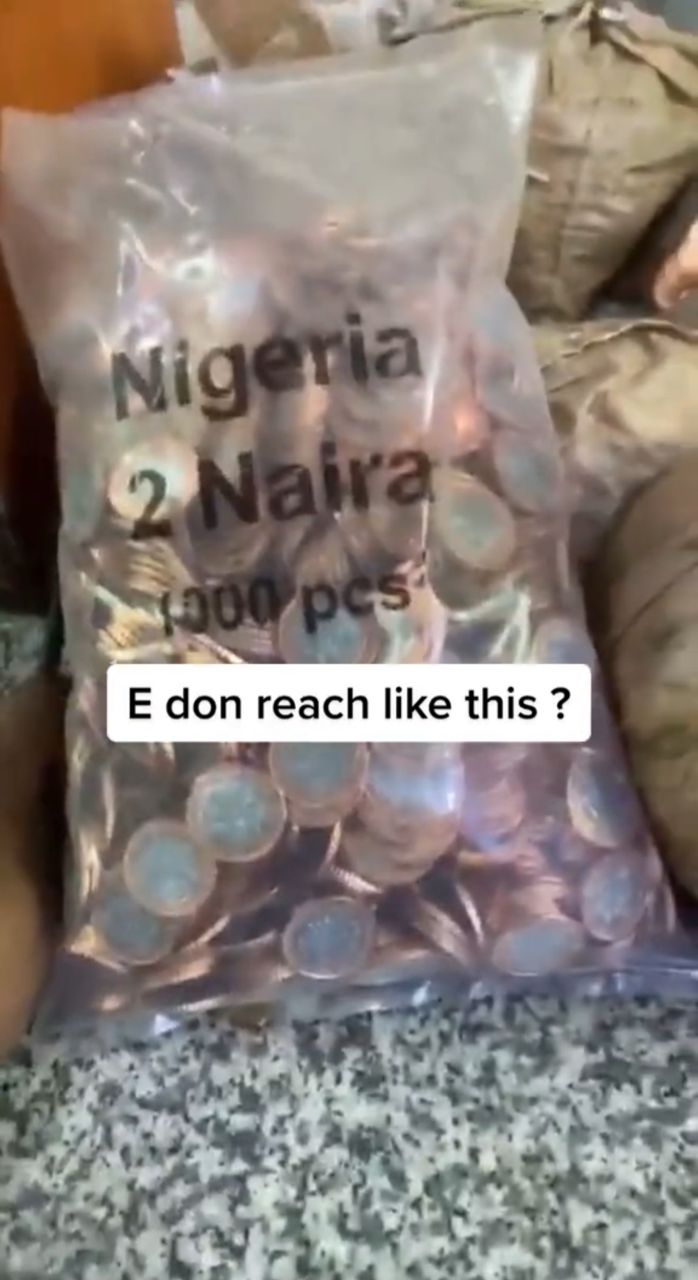 Customers lament as bank hands out coins amidst Naira notes scarcity (Video)