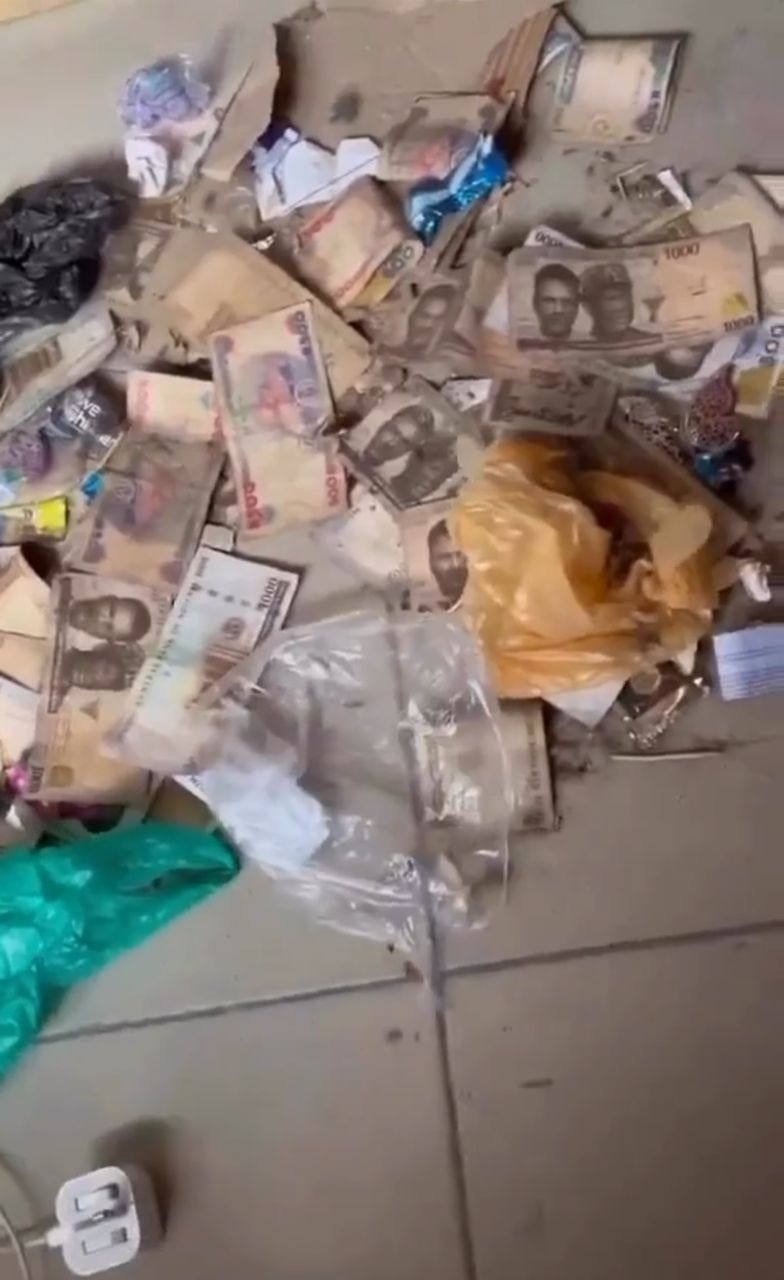 Man shocked as he finds old naira notes stashed under bed by wife