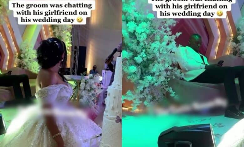 Groom pressing phone wedding day