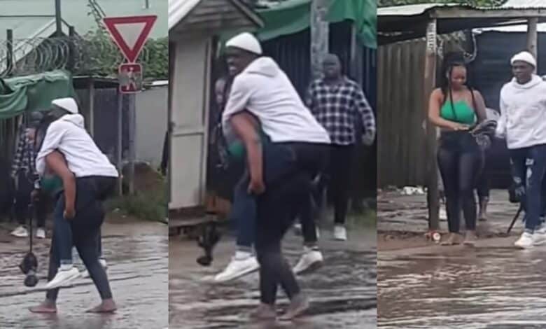 Man girlfriend back cross flooded road