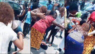 Drama as lady goes into labour while queuing for cash at bank in Port Harcourt (Video)